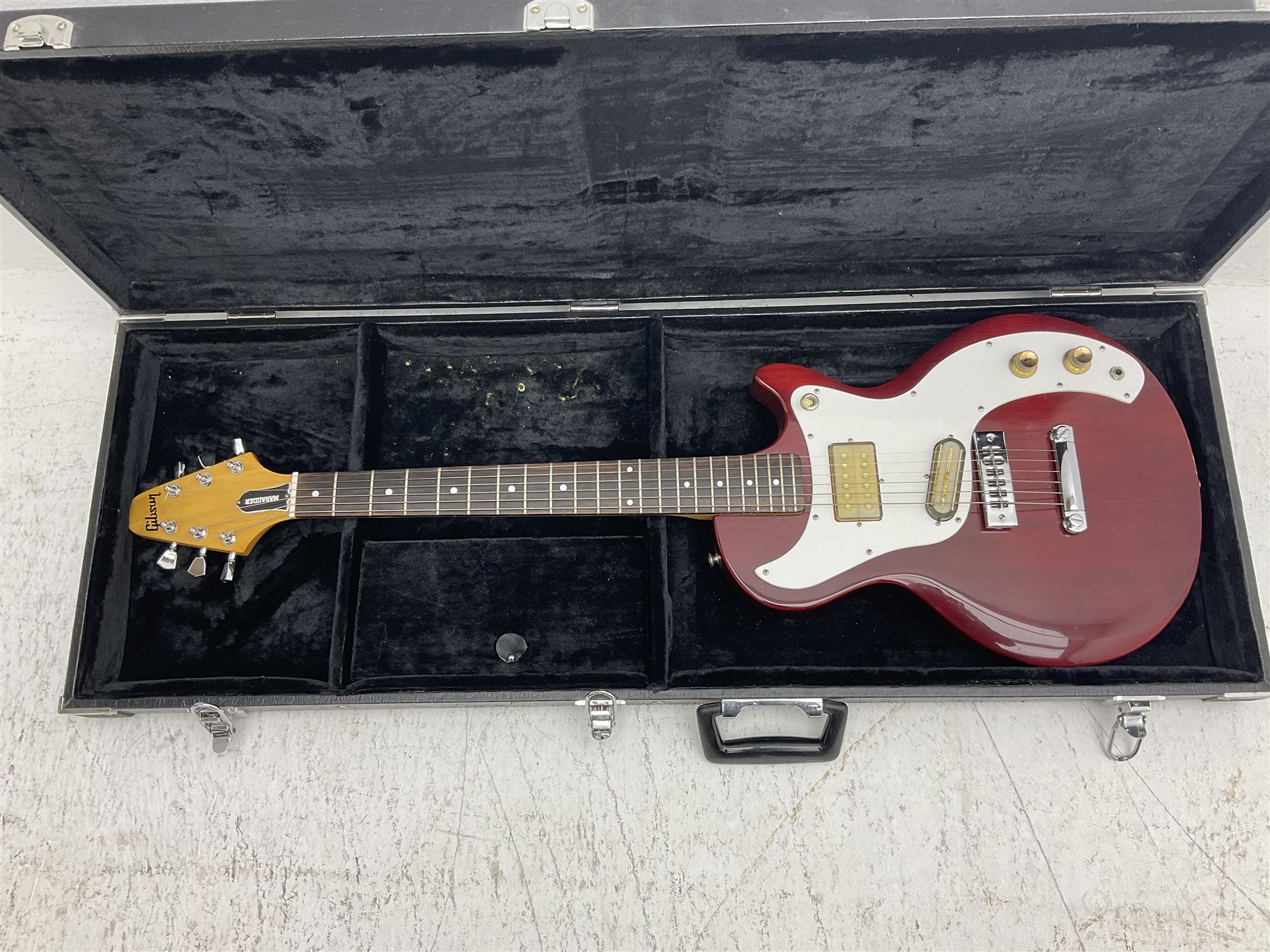 Gibson Marauder style six-string electric guitar with cherry coloured body, marked made in Japan L101cm; in locking hard carry case