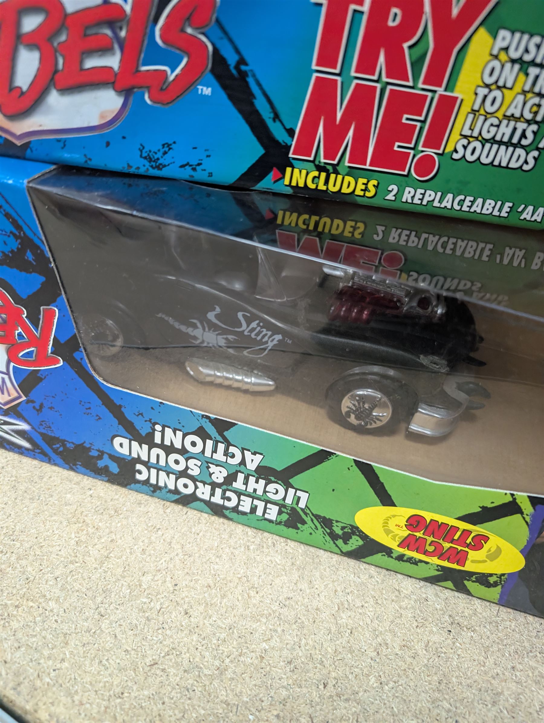 Collection of wrestler figures, two WCW Road Rebels vehicles and a collection of accessories