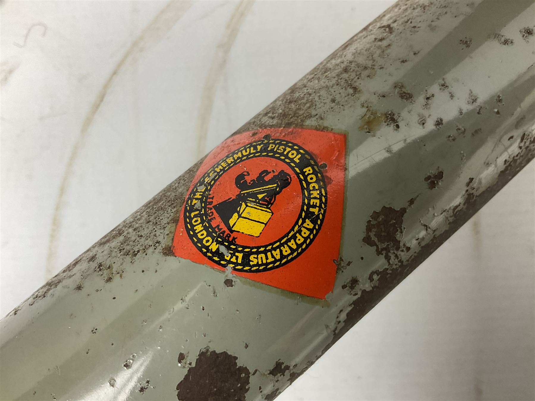 Schermulys Patent No.503324 nitro proof line throwing pistol No.15003; brass body with proof marks; the 32cm steel barrel with secondary handle over and original transfer 'The Schermuly Pistol Rocket Apparatus Ltd. London' L51cm overall