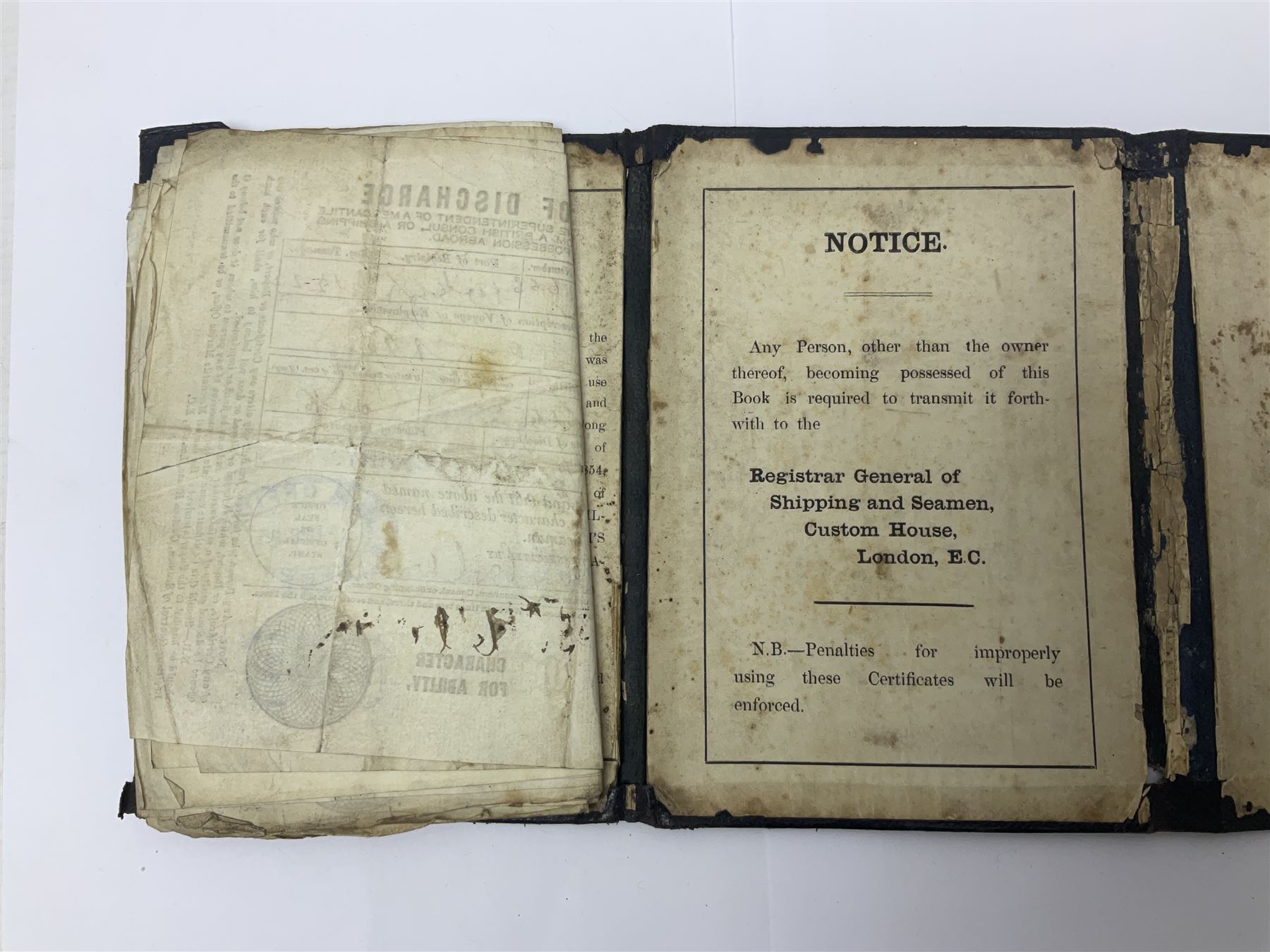 WWI pair of medals comprising British War Medal and Victory Medal awarded to 32682 Pte. W. Meadows W. Rid. R. in issue box; WWI pair of medals comprising 1914-15 Star and Victory Medal awarded to 3720 Pte. (later Cpl.) E. Petty W. York. R. with issue letter from Tank Corps; WWII group of five medals comprising 1939-45 War Medal, Defence Medal and 1939-45, Italy and Africa Stars; all with ribbons; and book of nineteen seaman's Certificates of Discharge to cook Charles Filburn 1893 - 1901 from various British ports