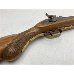 20th century Indian percussion musket, the 81cm octagonal barrel with under rib and ramrod, brass fittings including front and rear swivels, oak half stock with cheek piece and chequered pistol grip stamped 1589 L124.5cm overall