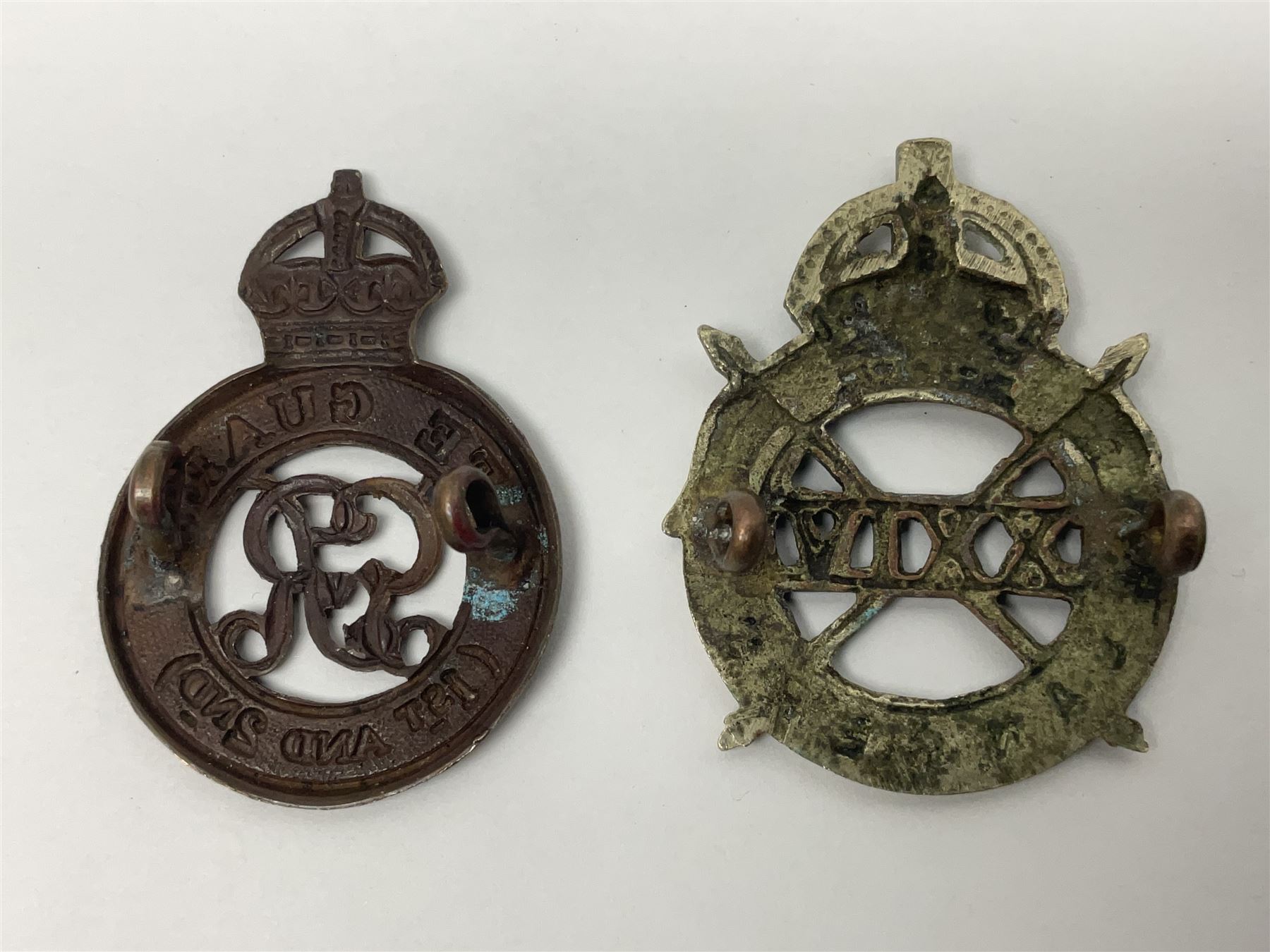 Nine Lancers metal cap badges including 9th, 12th Royals, 24th, 16th Queens and 17th; together with eight various Guards/Dragoons badges (17)
