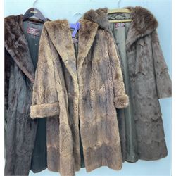 Four ladies three quarter length fur coats, by Dysons Furriers Ltd, Commercial St, Leeds, comprising of a light brown mink fur coat, two dark brown mink fur coats and another brown fur coat.  
