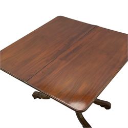 19th century mahogany tea table, fold-over swivel rectangular top with rounded corners, the frieze decorated with carved leaf motifs and applied beading, lyre shaped support on carved anthemion, rectangular platform on four out-splayed S-scroll supports with brass castors 