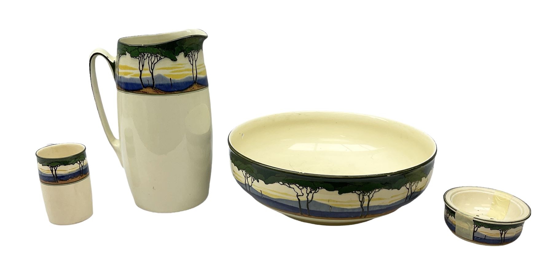 1930's Art Deco Royal Doulton ceramics decorated with stylised trees, comprising washbowl and jug, soap dish and vase