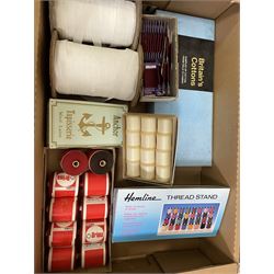 Twelve boxed sets of Clark's Anchor Fast Colour Stranded Cotton displayed on Perspex stand, together with various other cottons and threads in three boxes