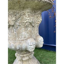 Stone effect garden urn/planter, egg and dart moulded rim, the body decorated with trailing vine leaves and grapes, the gadroon moulded underside set with grotesque masks - THIS LOT IS TO BE COLLECTED BY APPOINTMENT FROM DUGGLEBY STORAGE, GREAT HILL, EASTFIELD, SCARBOROUGH, YO11 3TX