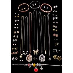 Collection of costume jewellery including seven necklaces, charm bracelet and three other bracelets, and twenty-nine pairs of earrings