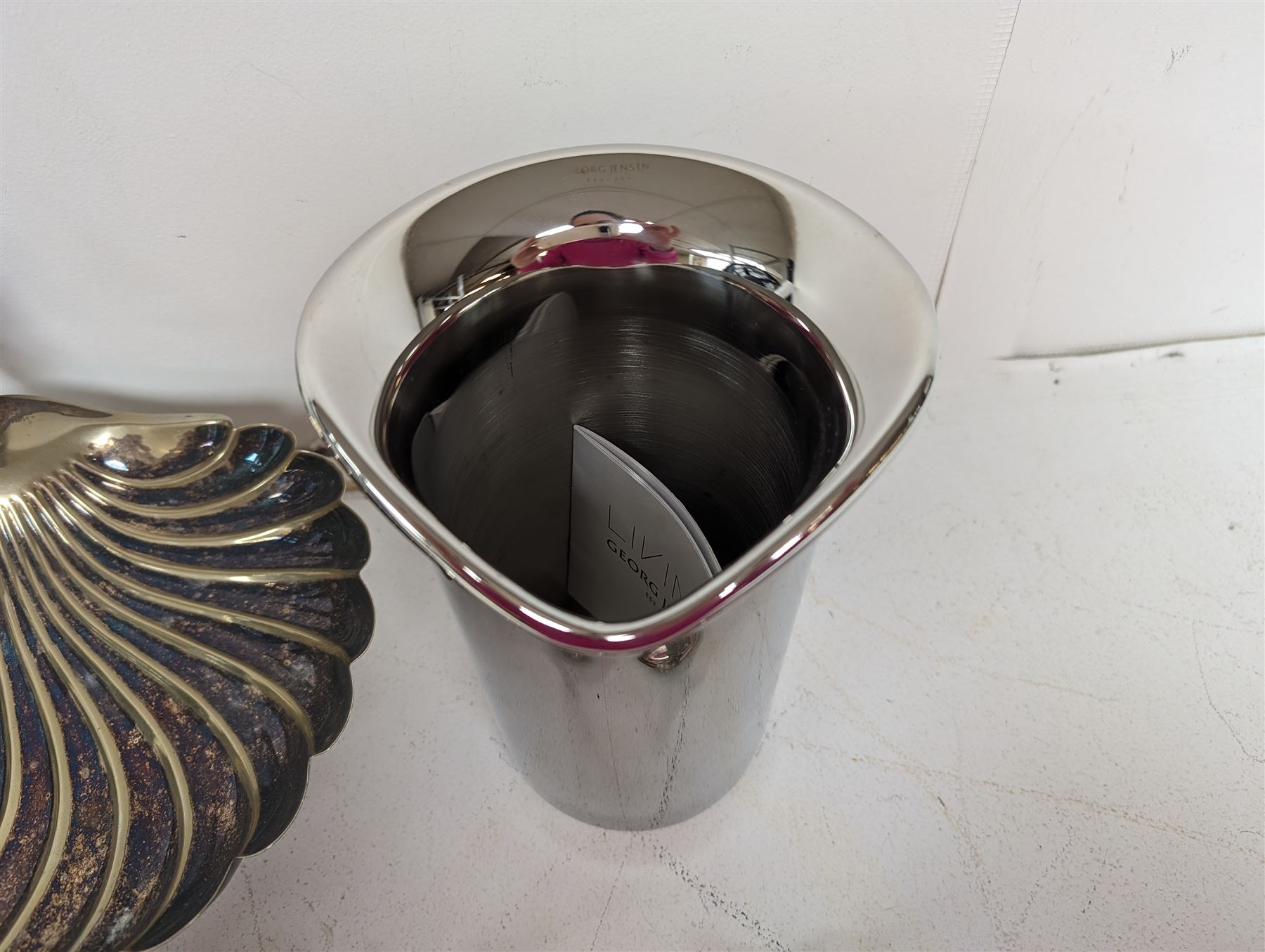 George Jensen stainless steel wine cooler, together with a silver plated pedestal dish, in the form of a clam shell and with squirrel decoration and four silver plated trinket dishes with applied pheasant decoration