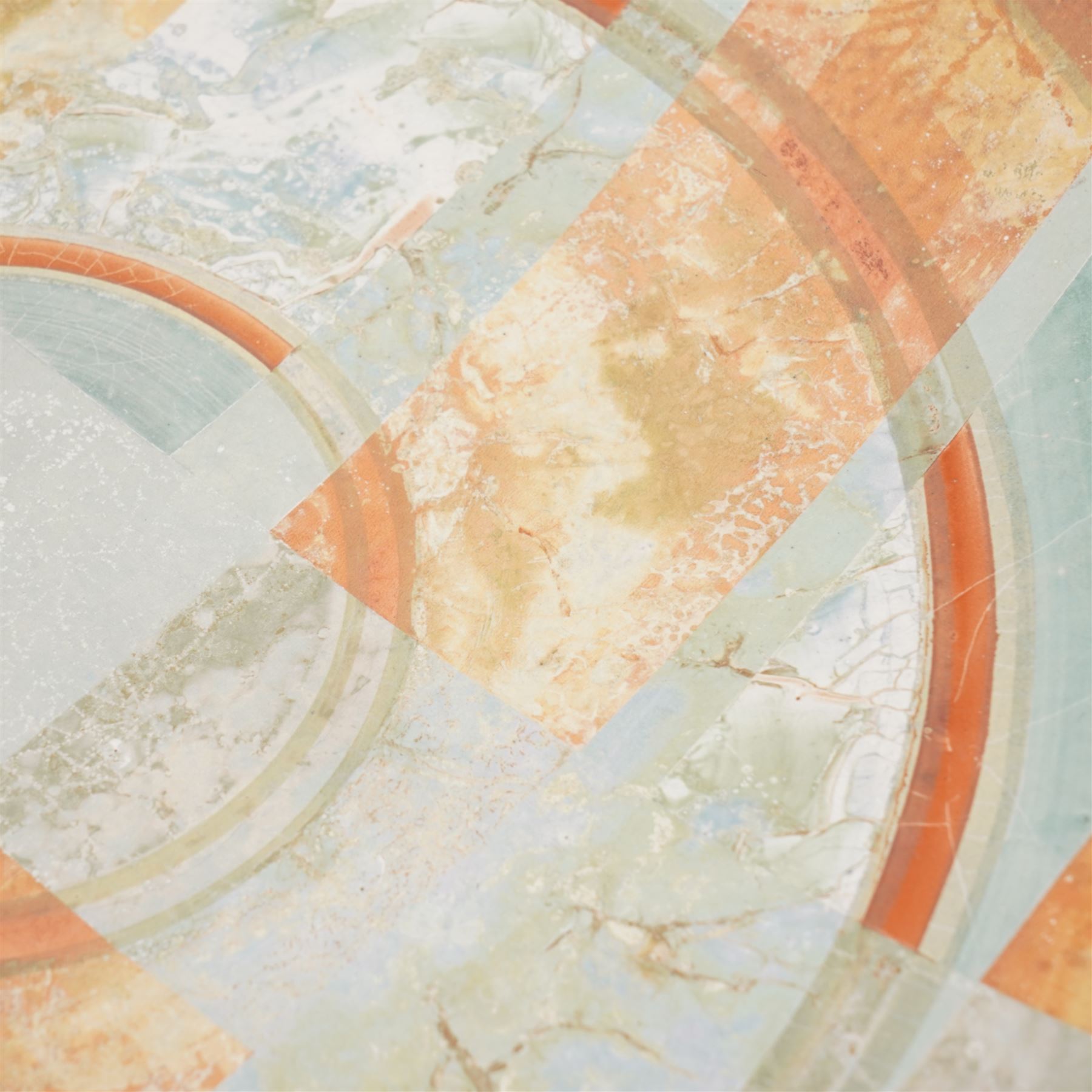 Tony Laverick (1961-); Charger painted with crossing horizontal and vertical lines of marbled blue and orange, the base signed with initials and dated '98, D42.5cm and a smaller bowl, signed with initials and dated '99, D26cm (2)