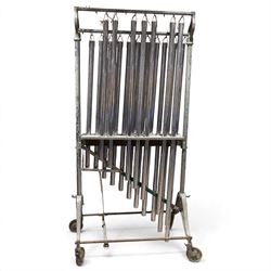 Boosey & Hawkes Ltd, London orchestral tubular bells/chimes, the chromed tubes pitch-marked and suspended on painted metal frame, frame H186cm