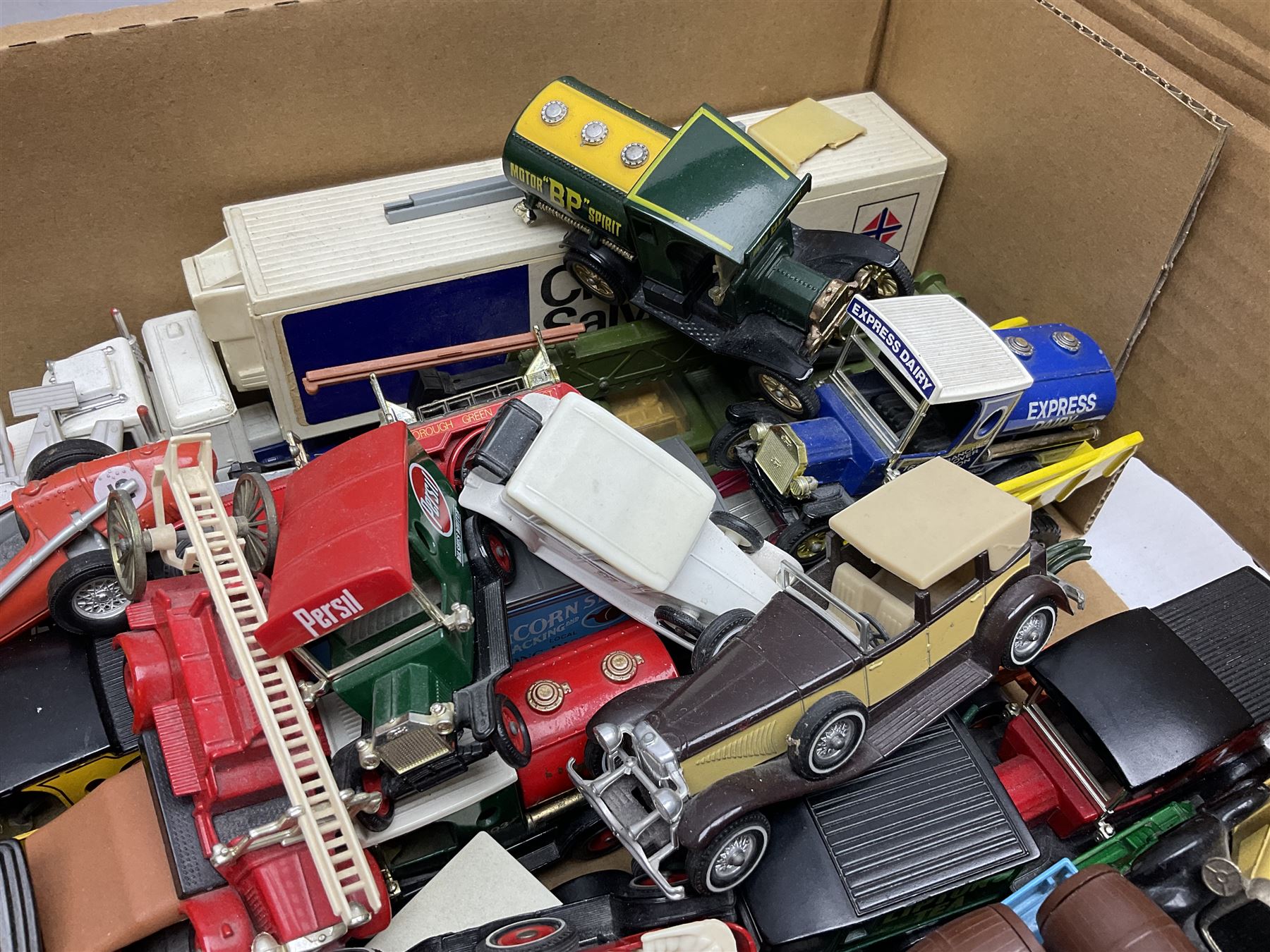 Over fifty modern die-cast models, predominantly Matchbox, including cars, promotional  and commercial vehicles; and a quantity of flat-packed model boxes