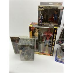 Three Disney Store Marvel Avengers Deluxe Figurine Sets; Spiderman Walkie-Talkie Set; Schleich Batman v Superman action figure Set; and Angus Young of AC/DC action figure; all appear mint in unopened boxes (6)