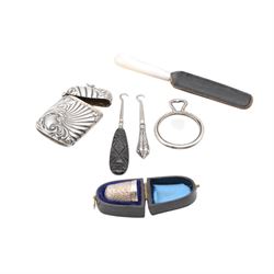 Edwardian silver cigarette case, embossed with floral decoration, hallmarked George Frank Bickerton, Birmingham 1901, together with a silver vesta case, six silver thimbles and three plated thimbles, miniature silver mounted mirror, mother of pearl handled silver fruit knife, and two button hooks