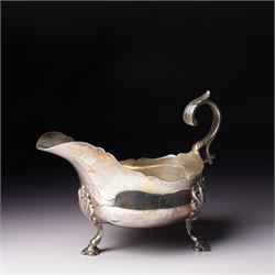 Late Victorian silver sauceboat with crimped rim, C scroll handle on shaped supports Sheffield 1899 Maker Martin Hall & Co, retailed by Allen & Daws, Norwich
