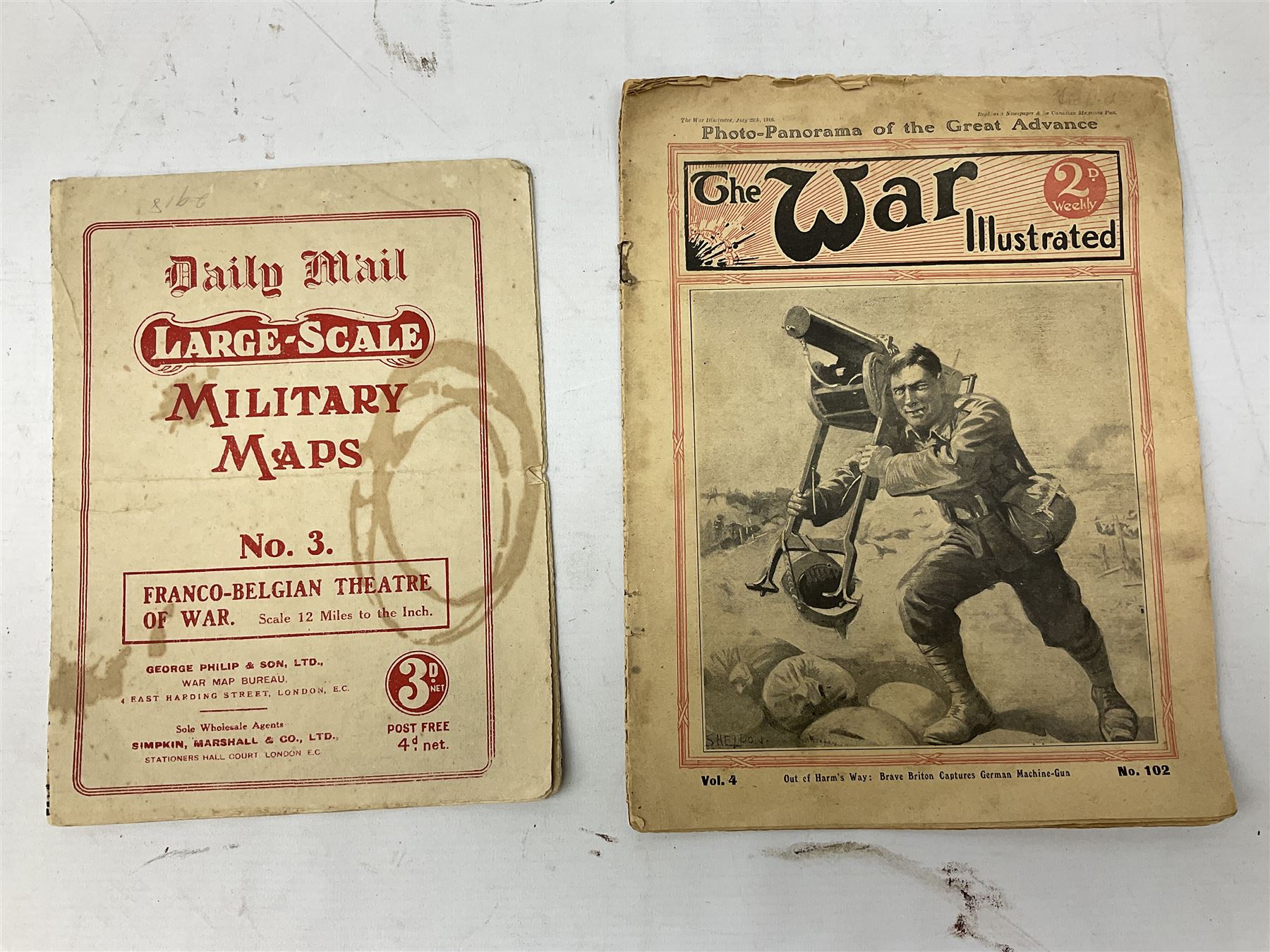 Three WW1 embroidered silk handkerchiefs including RAF & RN; trench art brass napkin ring inscribed 'Arras' and miniature peaked cap with inset 1914 penny; small quantity of cap badges and pips; four reference books on medals and badges etc