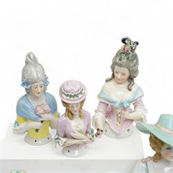 Collection of early 20th century ceramic half dolls, approximately 25