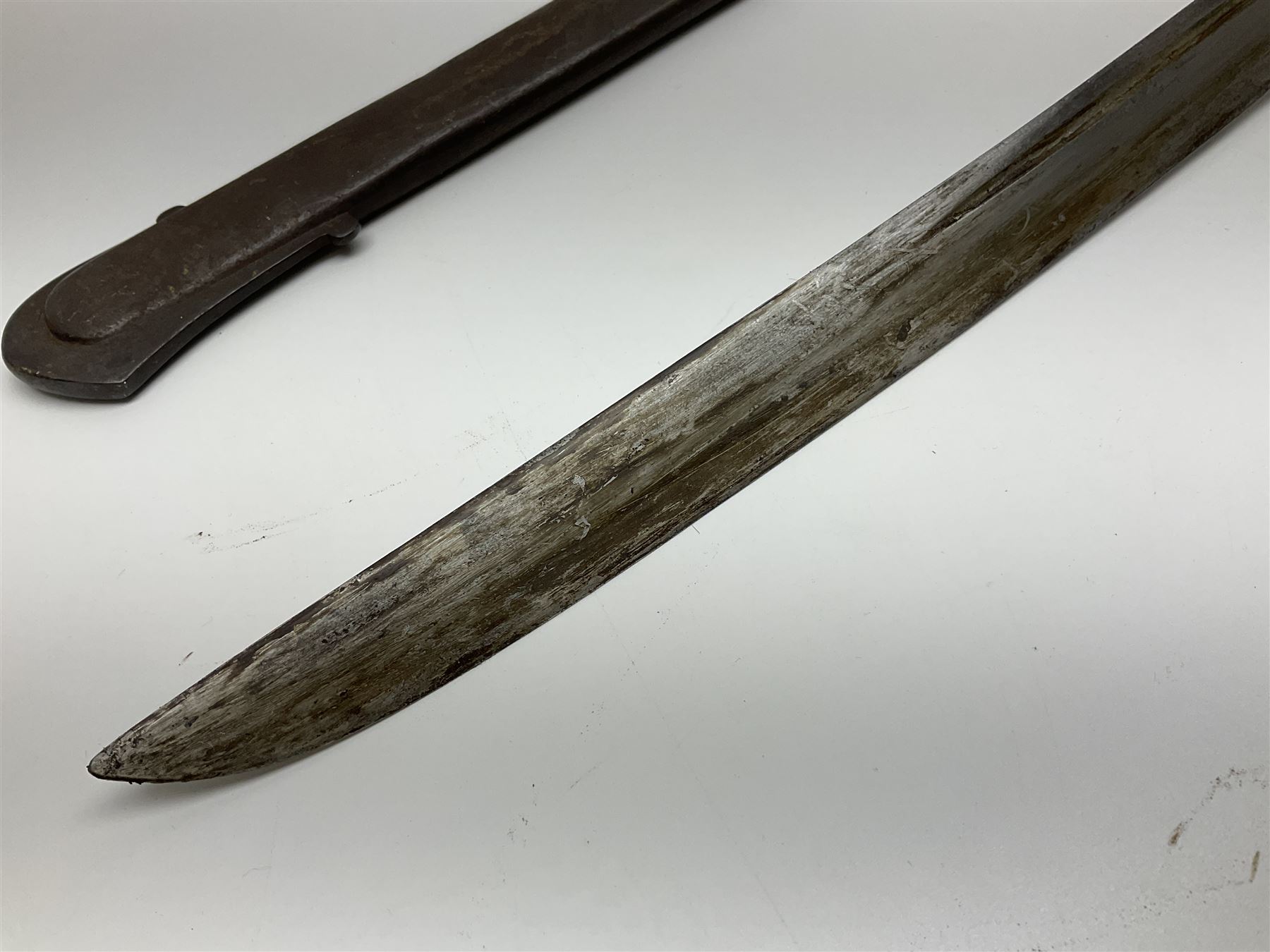 19th Century German (Saxony) Cavalry Sword, the 90.5cm single edge curved steel blade with narrow fuller to the back edge at each side, engraved with a crowned AR monogram and coat of arms, stamped with crowned AR, the back edge engraved C.v Keller im Solingen 1862, the brass half basket hilt with three flat curved bars, applied badge missing, marked G.R. 4, with ribbed leather covered grip and leather finger strap; in steel scabbard with two fixed suspension rings to one side and stamped G.R. II 118; L109.5cm overall