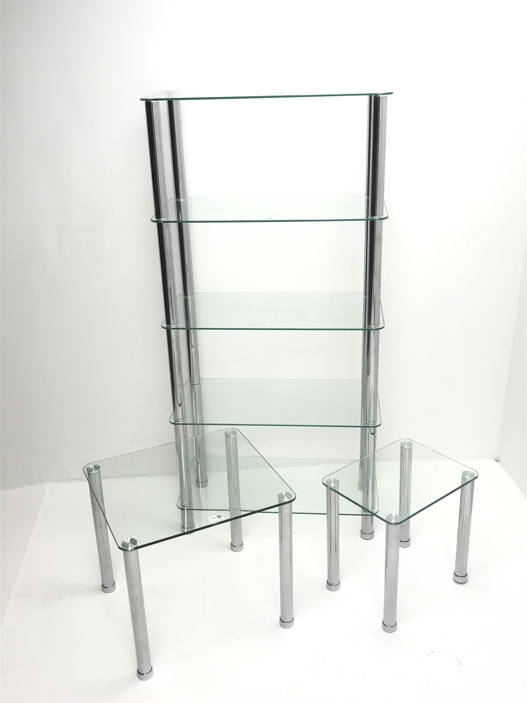 Chrome and glass nest of two tables (W50cm, H46cm, D45cm) and matching storage stand (W71cm, H147cm, D35cm)