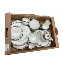  Wedgwood Chartley pattern dinner service for six, including dinner plates, dessert plates, six twin handled soup bowls etc, together with a near matching teapot
