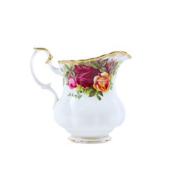 Royal Albert Old Country Roses tea set, comprising cake stand, milk jug, seven dessert plates, seven cups and ten saucers 