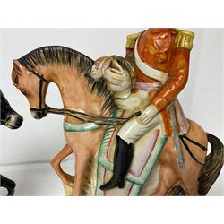 Staffordshire figure of the Duke of Wellington on a bay horse, H30cm in red uniform, together with a similar Staffordshire figure of Dick Turpin, pair of Staffordshire style dogs, H27cm, three Meissen style double salts and two trinket boxes 