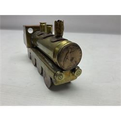 Trench Art - WWI 0-8-0 steam locomotive made from brass, copper and late Victorian pennies and half-pennies L17.5cm; WWI brass and copper tank candleholder; WWI brass shell case two-handled vase inscribed 'RFA France 1914-17'; and an unrelated brass plant holder (4)