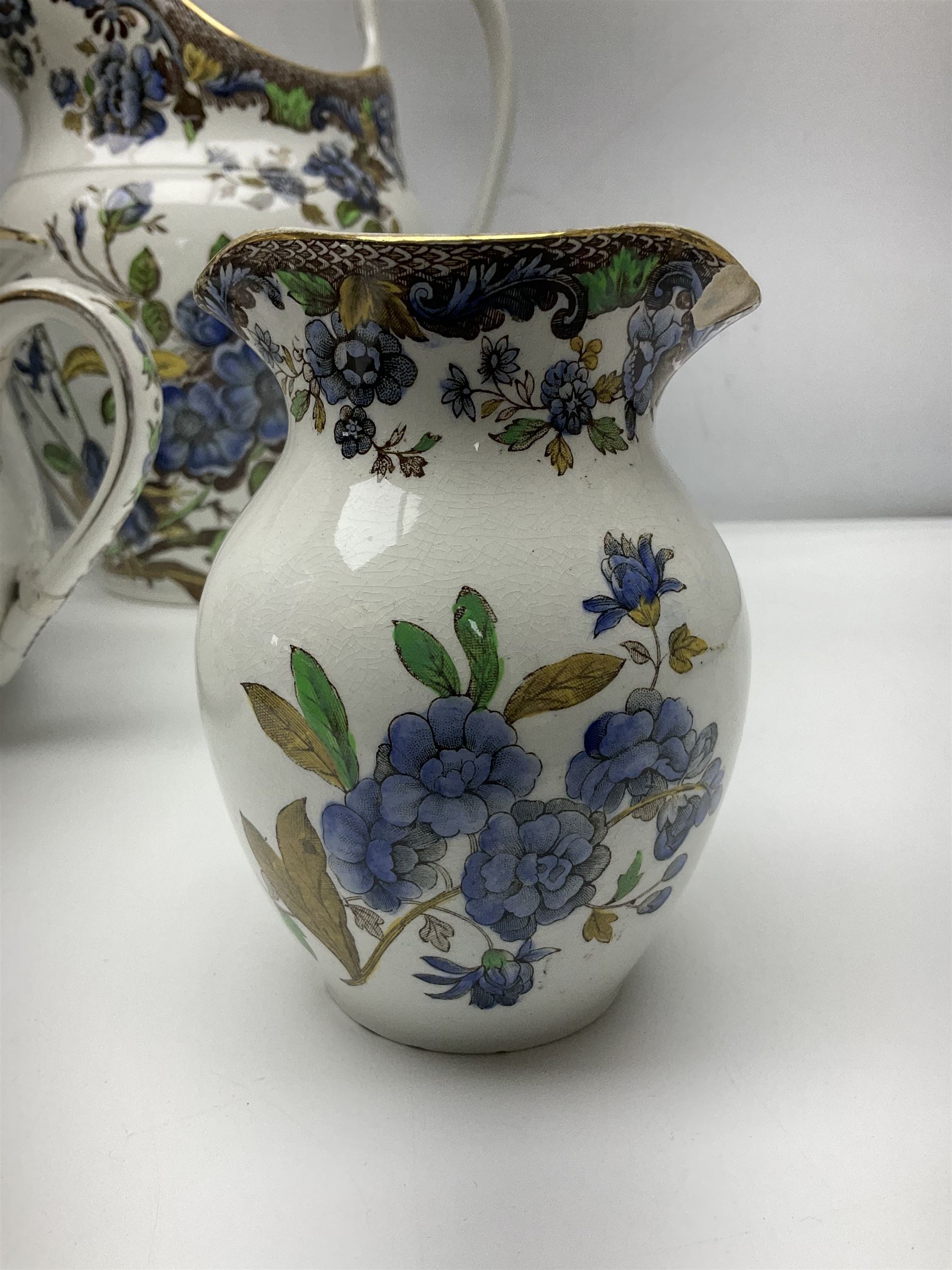 Copeland Spode toilet set in blue flower pattern, comprising wash jug, slop bucket, two soap dishes, toothbrush holder and chamber pot, slop bucket H28cm