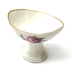 A Höchst eyebath c.1775, the oval bowl painted in polychrome enamels with floral sprays, blue wheel mark, H3.5cm.