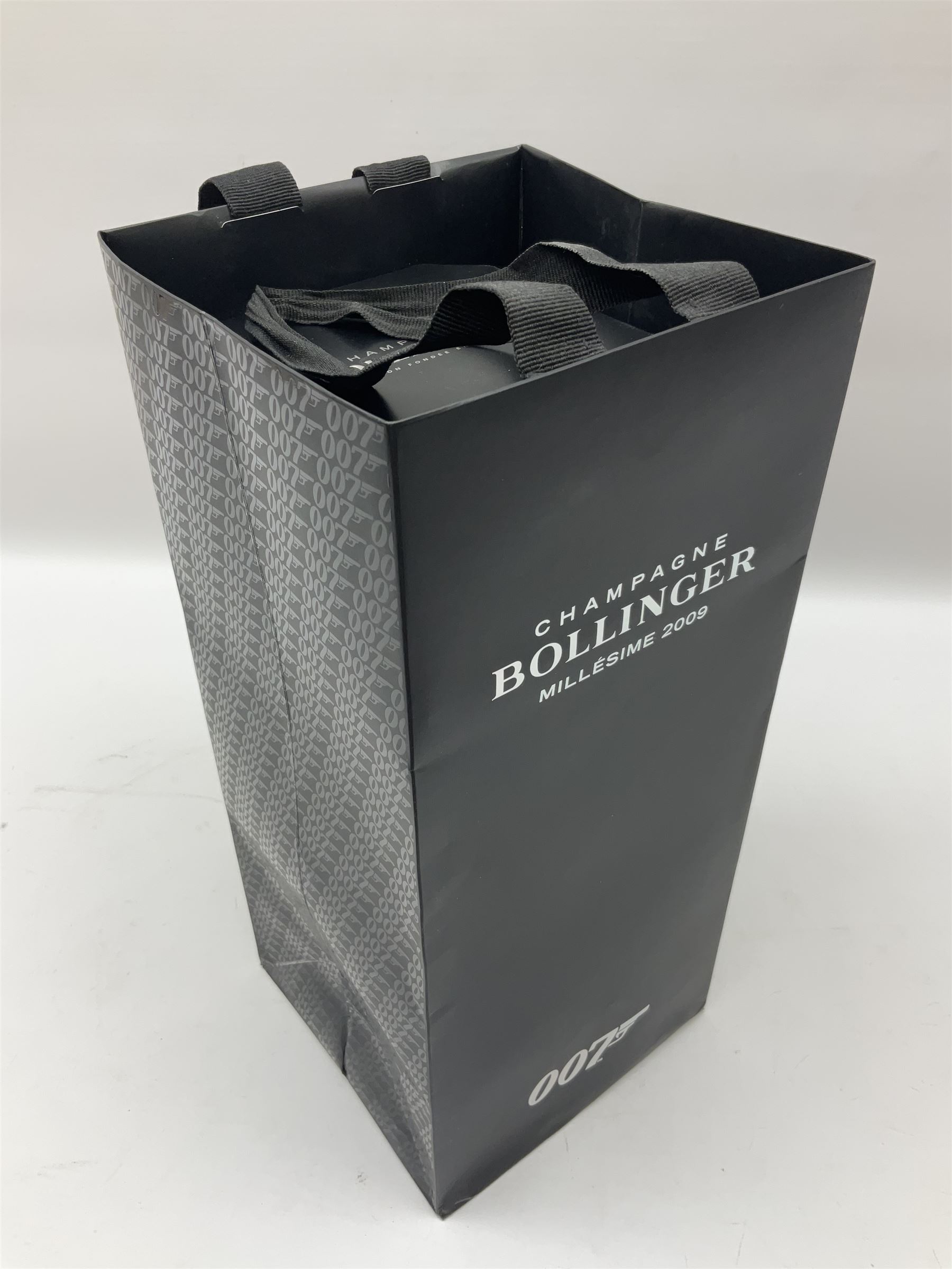 Bollinger Millesime 2009 James Bond 007 Spectre champagne, housed in original black twist open presentation case, with tags and bag, 75cl, 12% vol