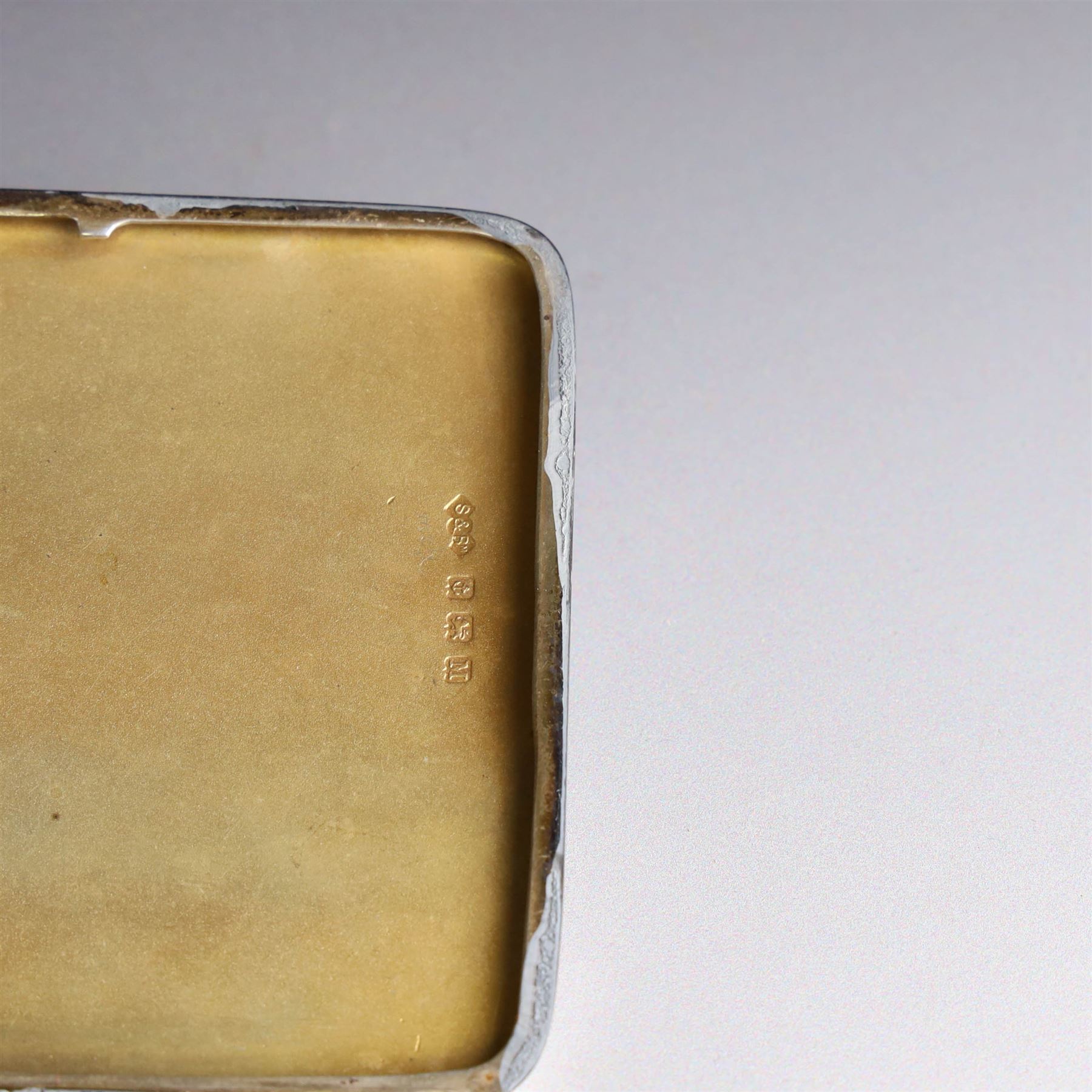 1930s silver cigarette case, of rectangular form with rounded corners, with engine turned decoration, hallmarked Smith & Bartlam, Birmingham 1936, H10cm