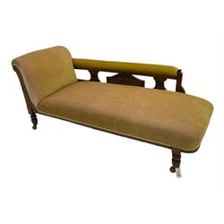 Late Victorian oak framed chaise longue, carved with shell and flower head motifs, on turned feet