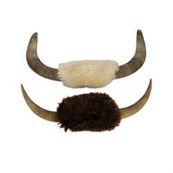 Antlers/horns; two pair of bull horns (Bos taurus), both with hair covered boss, L69cm