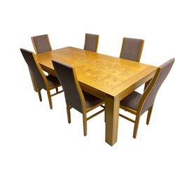 Large pippy oak rectangular dining table, square block leg, and six high back upholstered chairs, retailed by Chapmans of Newcastle