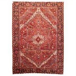 North West Persian Heriz hand-knotted carpet, madder red field, with a large central angul...
