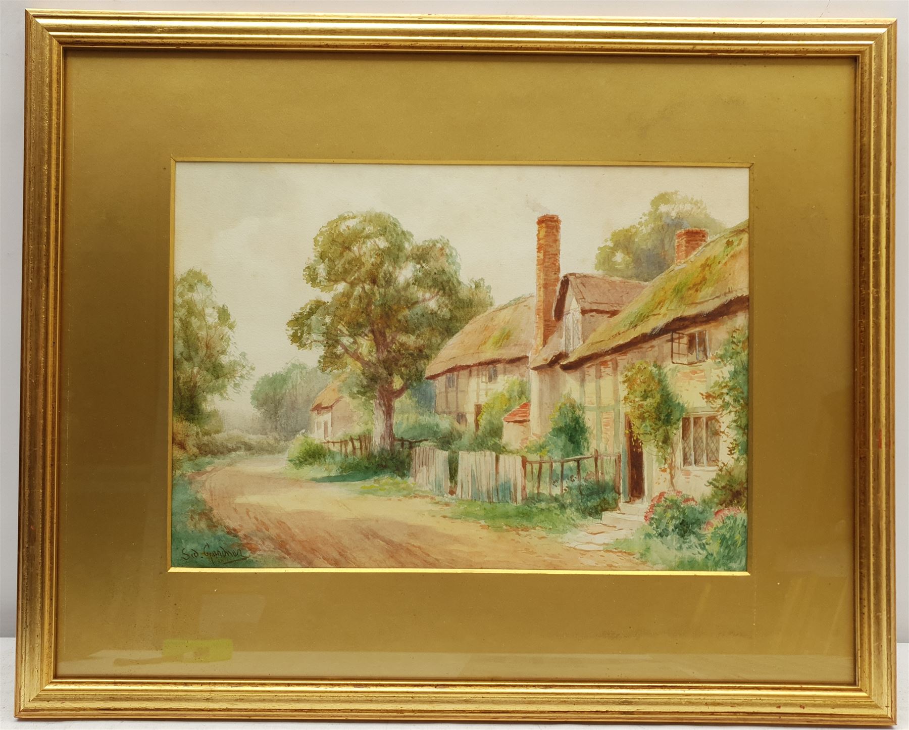 Sidney Valentine Gardner (Staithes Group 1869-1957): Thatched Cottages, watercolour signed 24cm x 34cm 