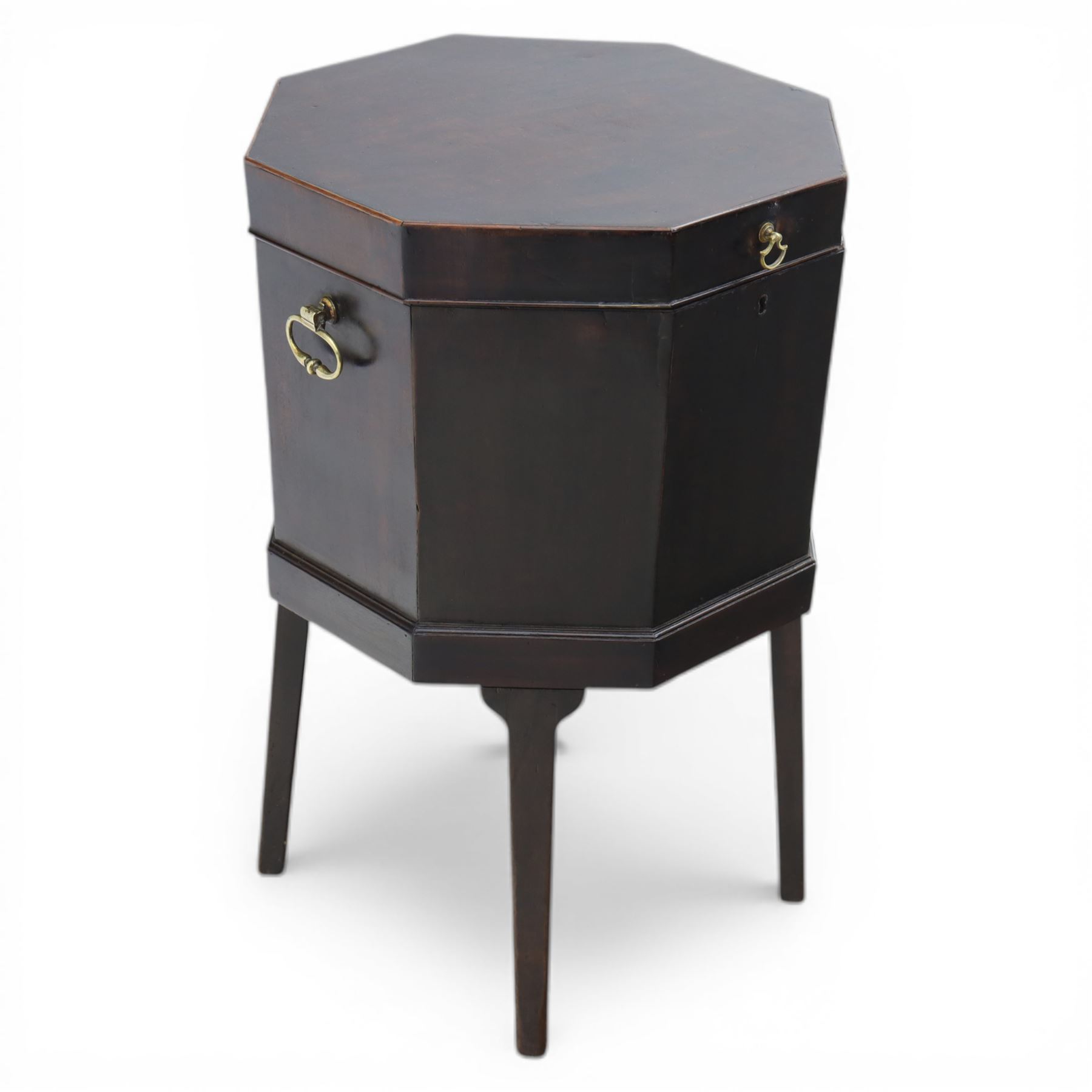 George III mahogany cellarette, of octagonal form with hinged top, brass handles and hinges, raised upon tapering supports