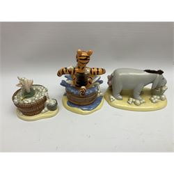 Nine Royal Doulton Winnie the Pooh Collection figures, including Oh Dear Bath Time's Here, Going Sledging, Tigger's Splash Time and Christopher Robin, together with a Royal Doulton Disney Showcase Jiminy Cricket figure, all boxed