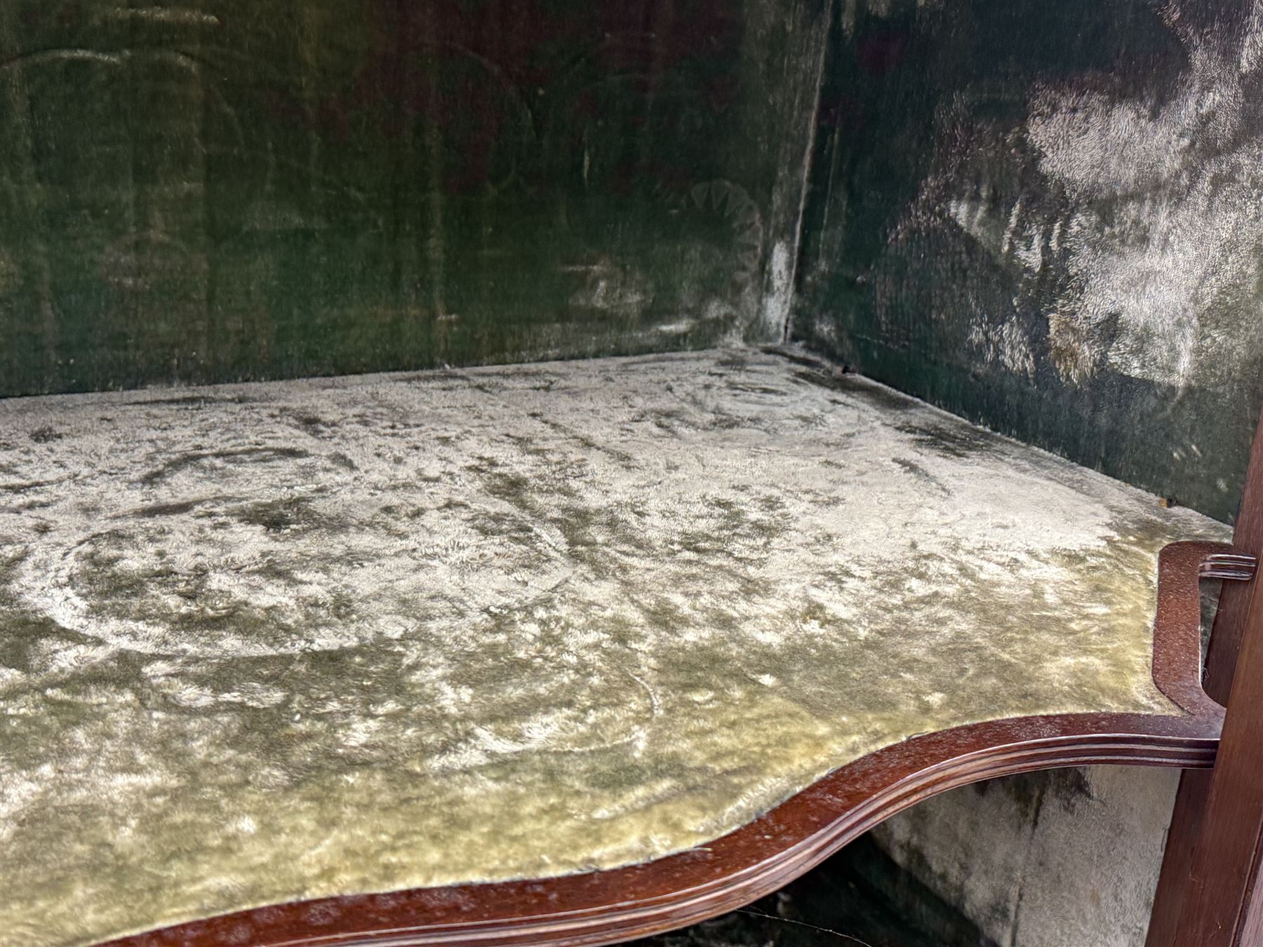 Victorian hardwood and inlaid display cabinet, central breakfront glazed display with astragal glazing and mirror back, flanked by mirrored alcoves with turned supports, below foliate and scrolling marquetry panels enclosing cupboard doors, shaped open shelves with turned supports beneath, on tapered and spade feet