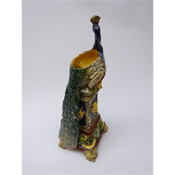  Wilhelm Schiller & Sons majolica vase modelled as a Peacock perched on pedestal, moulded satyr mask heads on mask feet, stamped, H35cm   