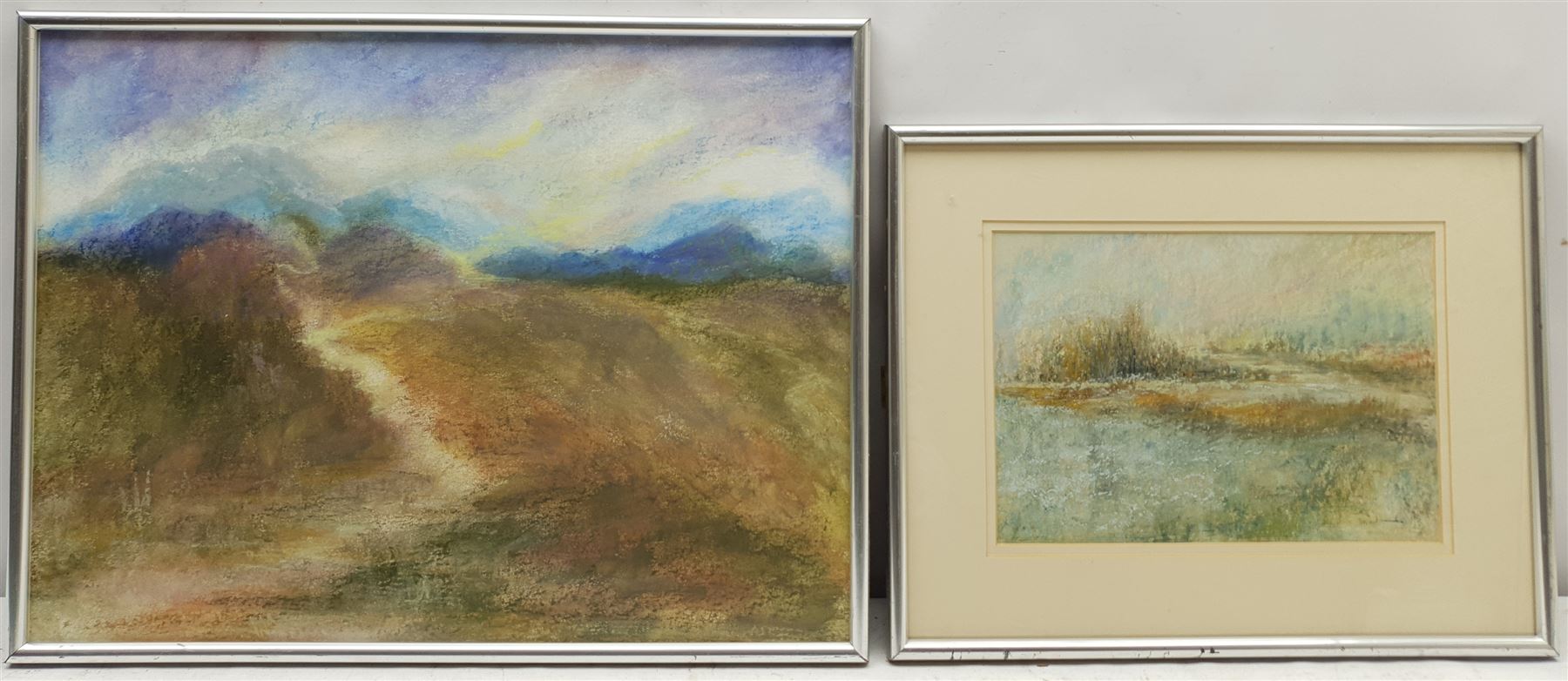 Madeleine Eyland (Belgian/British 1930-2021): Misty Landscapes, two pastels signed 35cm x 47cm and 18cm x 26cm (2) 
Provenance: artist's studio collection. Marie-Madeleine Eyland (neé Legrain) was born in 1930 at Floriffoux, Belgium; she lived most of her life in Scarborough working as a nurse and an artist.