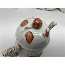 Herend Chinese Bouquet Rose pattern tea service comprising teapot, coffee pot, open sucrier, six cups and saucers, six tea plates, cream jug and stand, milk jug, two teabag holders, preserve pot, two leaf shaped dishes, four egg cups, salt & pepper pots, pair side plates and another plate