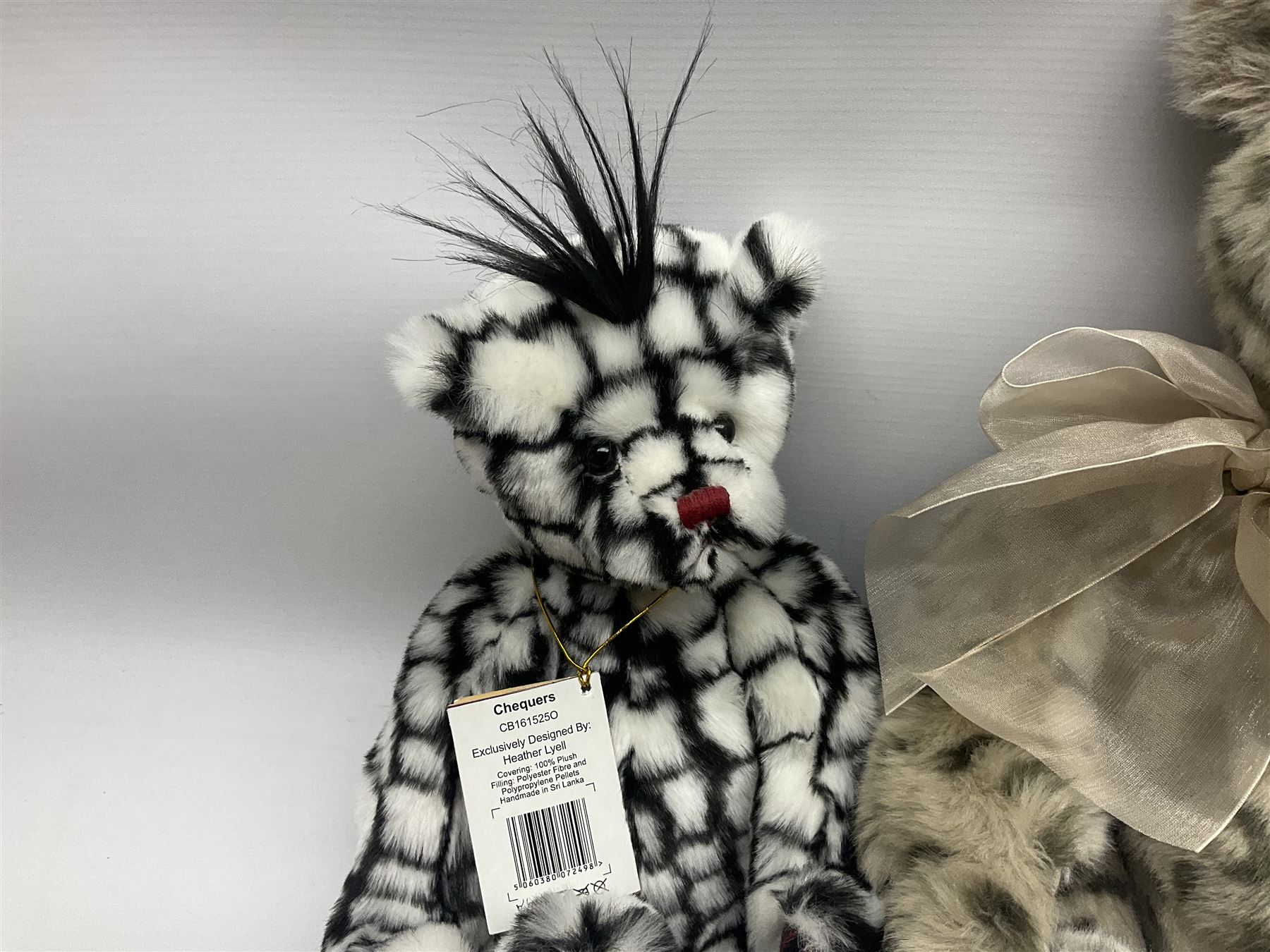 Four Charlie Bears, comprising Geoffrey CB131384, and Hawkins CB202024A, both designed by Isabelle Lee, and Tia CB161507O, and Chequers CB161525O, both designed by Heather Lyell, all with tags 