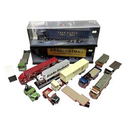 Corgi - two perspex cased 'Modern Trucks; 75202 ERF Curtainside Boddingtons and 75402 Leyland-DAF Curtainside Tate & Lyle; and nine unboxed Corgi lorries (11)
