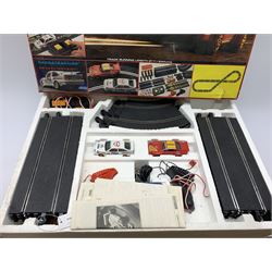 Scalextric, Alpine Rallye, Electric Slot Racing Set Newmarket, Super Saloons, and Night Stages. (4). 