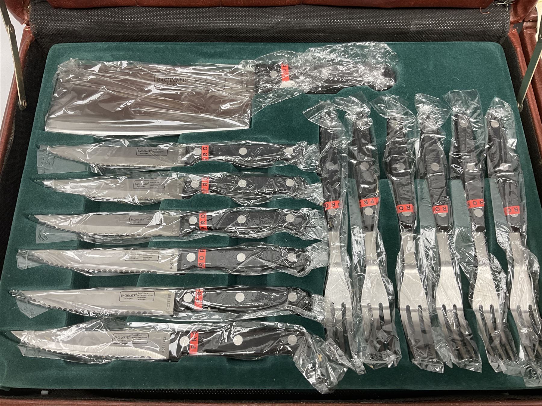 Bachmayr Soligen boxed set of six steak knives and fork, together with Offenbach chef quality knives, chopper, forks, scissors and knives sharpeners, in fitted cases