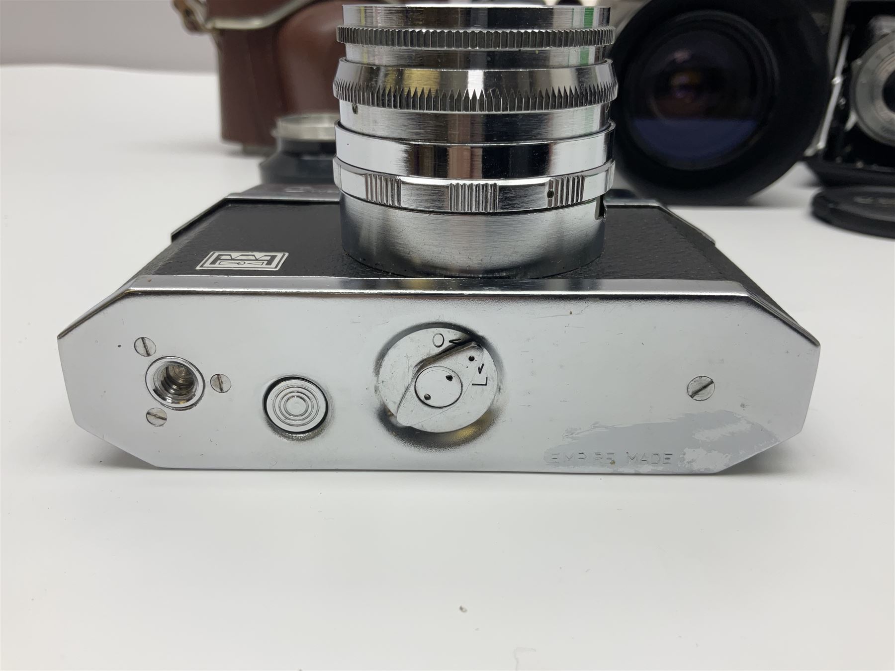 Canon EOS 50e camera body, serial no 8305671 with 'Canon Zoom EF 35-135mm 1:4-5.6' lens together with Halina 35X super camera body, with 'Halina Anastigmat f.c. 1:3.5 f=45mm' lens and other camera equipment 