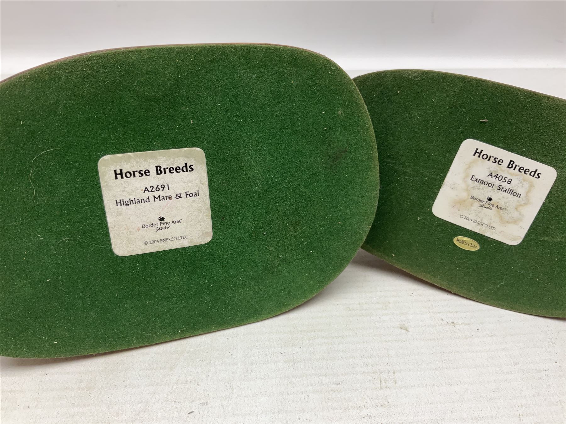 Collection of Border Fine Arts figures, comprising Exmoor Stallion A4058, Highland Mare & Stallion A2691, Welsh Cob A20804, On The Farm A0167, calf figure with bucket and figure group of cow and farmer with cat and kittens (6)