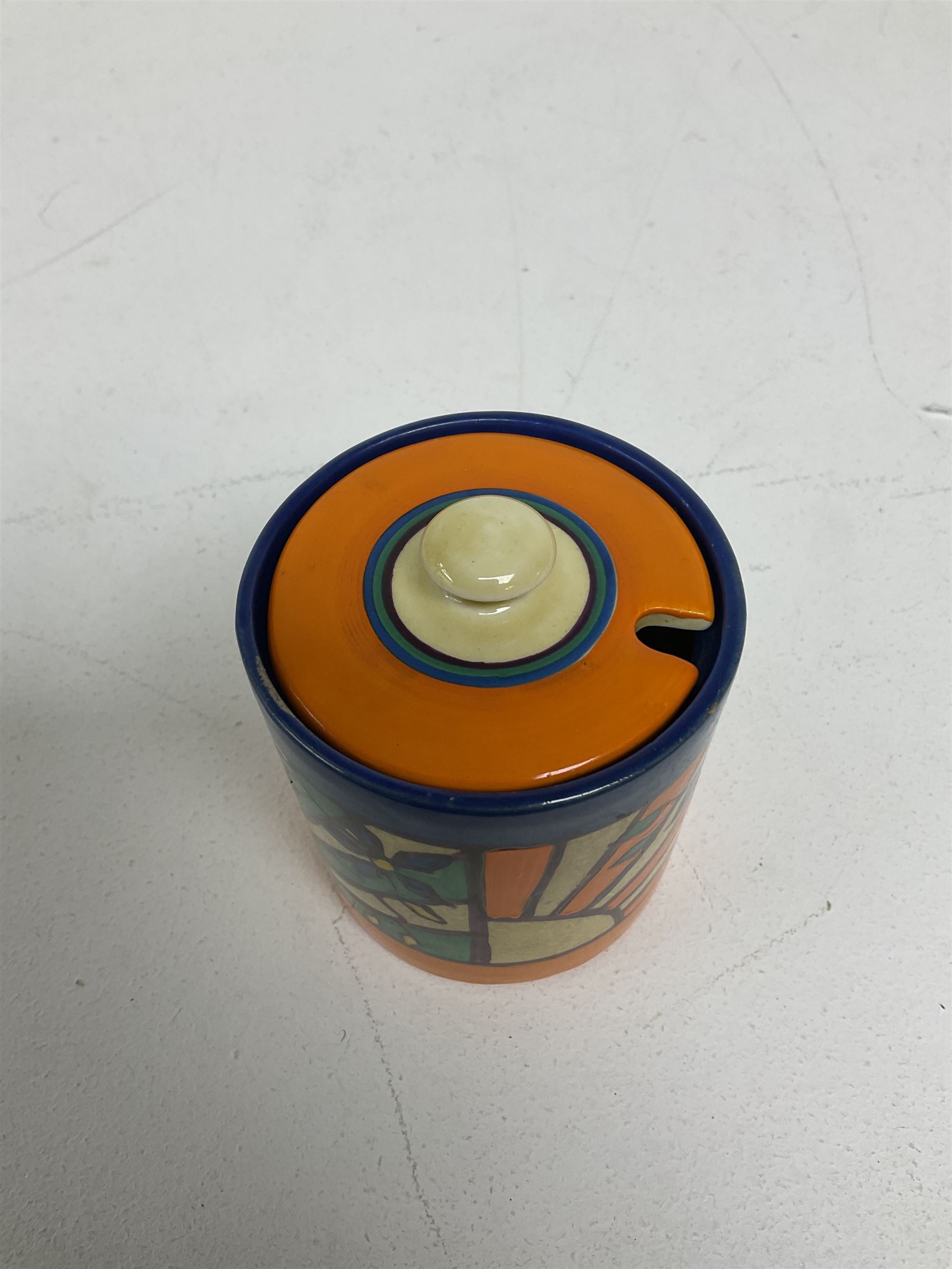 Clarice Cliff Fantasque for Wilkinson Pottery preserve pot, circa 1928, of drum form decorated in Sunray Leaves pattern, H8cm