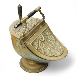 Victorian brass and copper helmet shaped coal scuttle with embossed hinged cover, turned w...